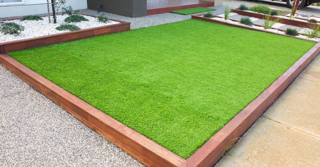 Front yard turf and pebble landscape