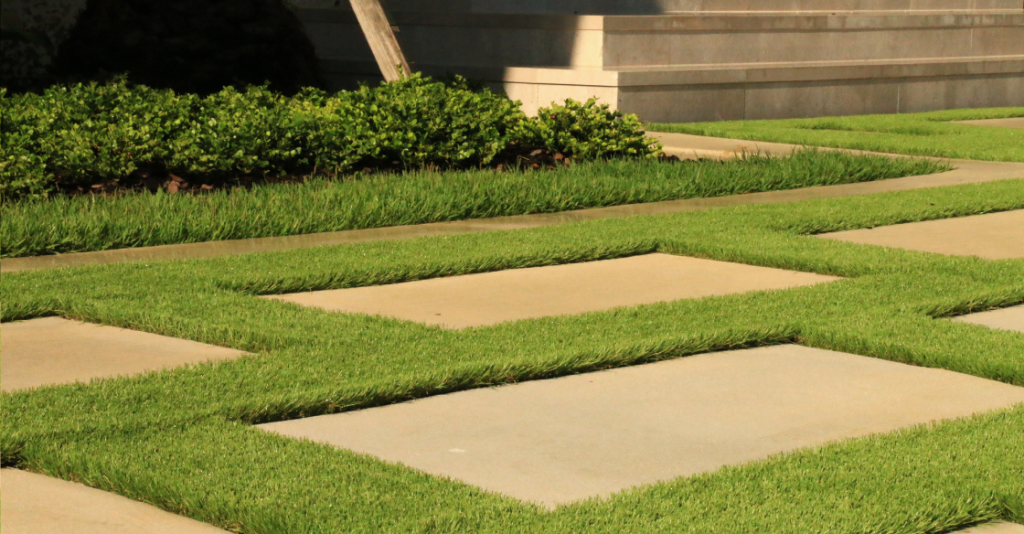 Concrete pavers with artificial turf