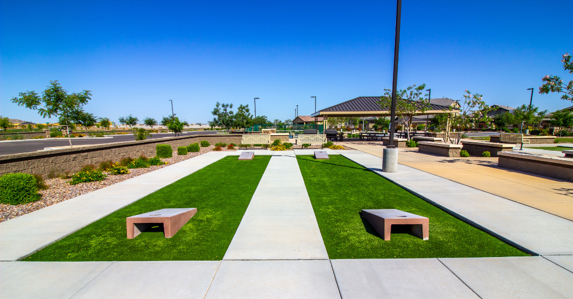 Outdoor corn hole game on artificial grass