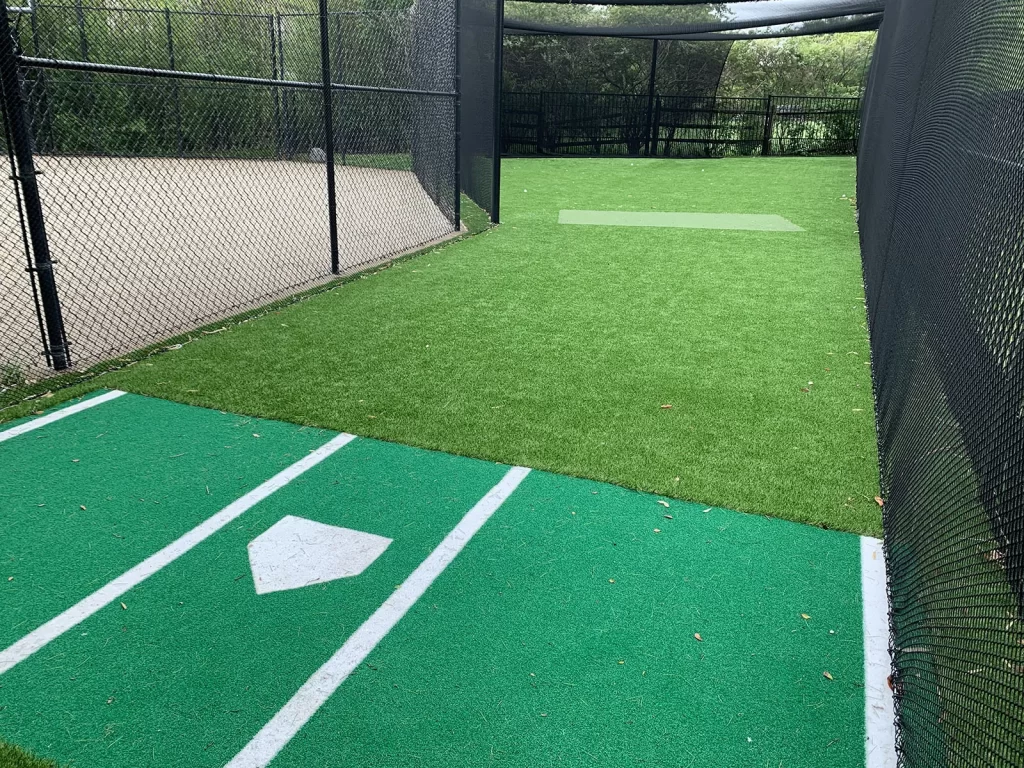 Baseball cage artificial grass installation