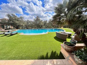 Luxurious Hamptons-Style Pool Area with Artificial Grass